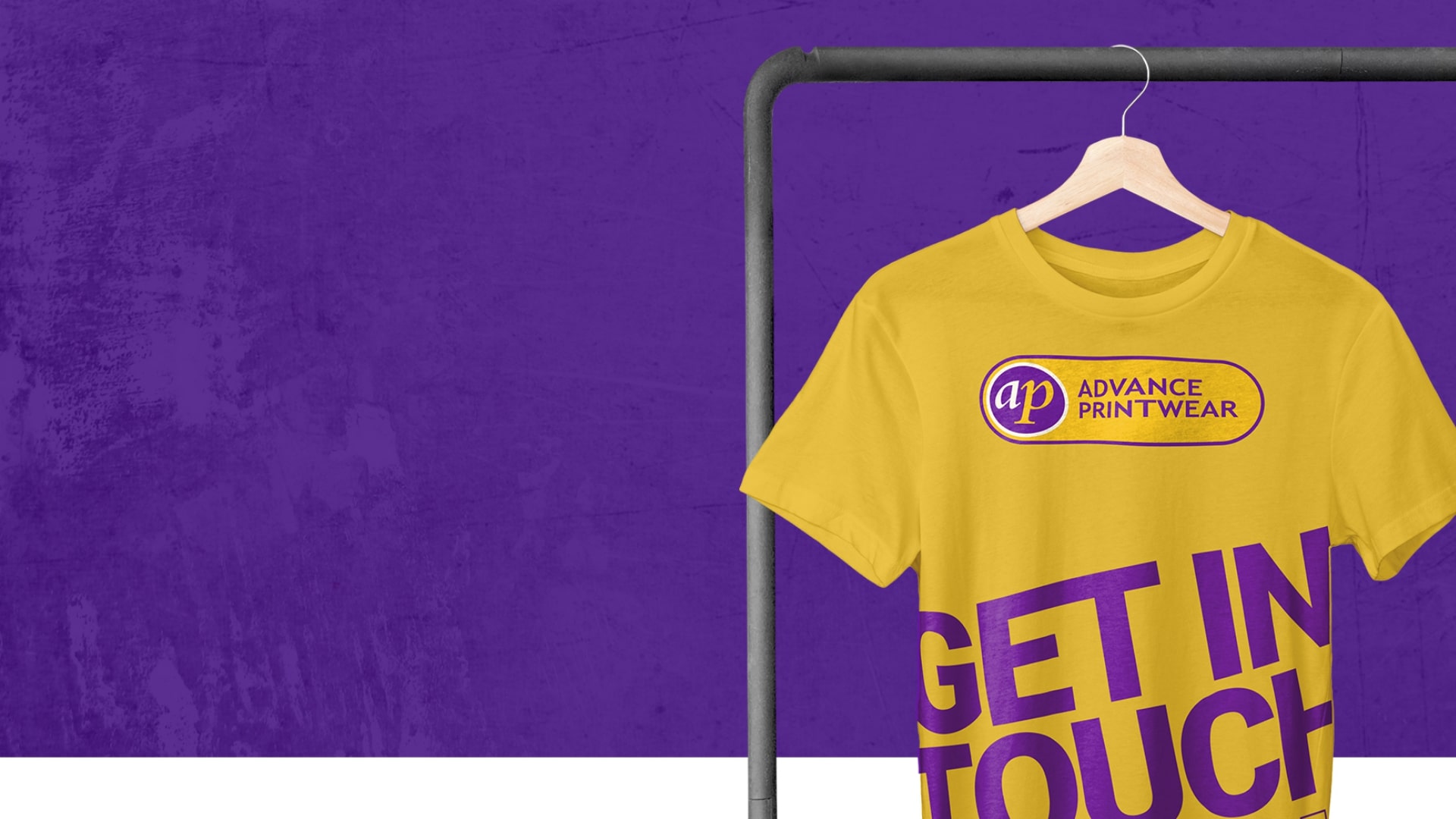 Yellow t-shirt with get in touch printed on it hanging up
