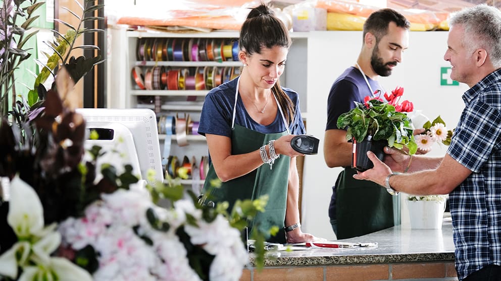 Florists in apron uniforms